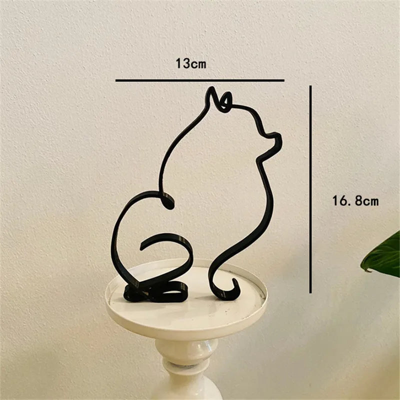Metalna skulptura psa – apstraktna minimalistička figura za dom