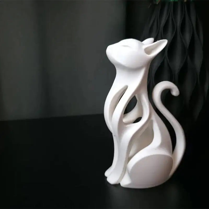 Elegant modern cat sculpture in a sitting position - 3D printed decoration