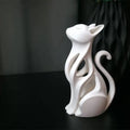 Elegant modern cat sculpture in a sitting position - 3D printed decoration