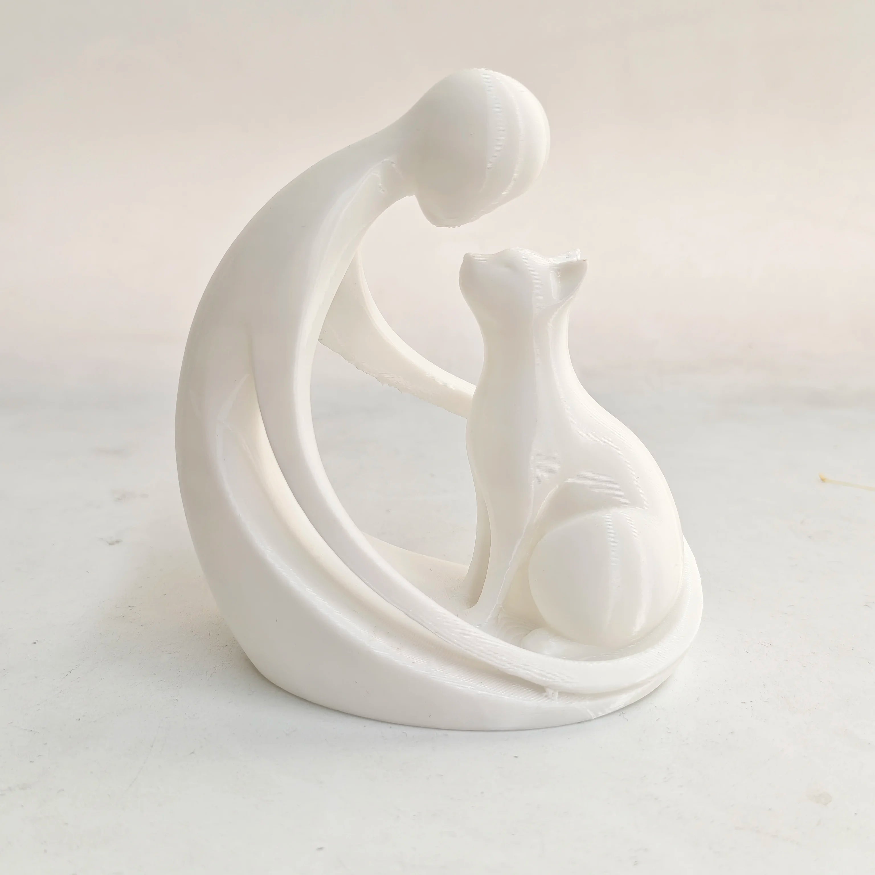 Modern abstract figure of man and cat – table decoration, gift